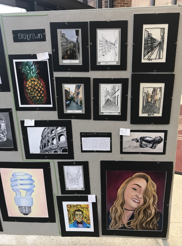  “Most of these are part of my concentration,” senior Ella Brown said. “And this one is my self portrait which I worked hard on this year.” 