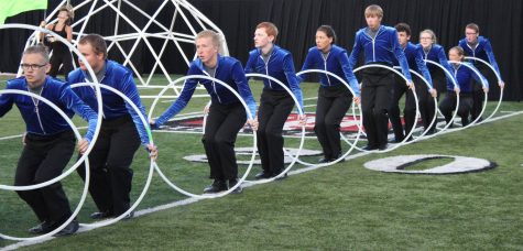 Marching band perfects Light Motif to win competition