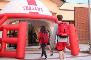 The inflatable Trojan helmet created a surprise entrance for students going into the Hall of Excellence before school.