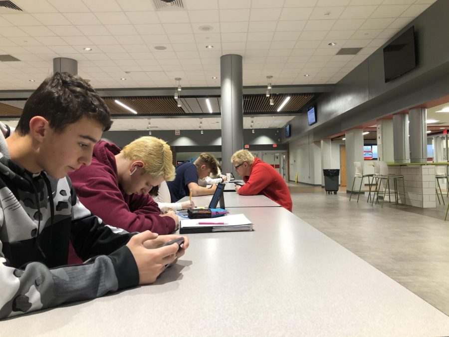 Students work and play on their phones during Period 1 study hall.
