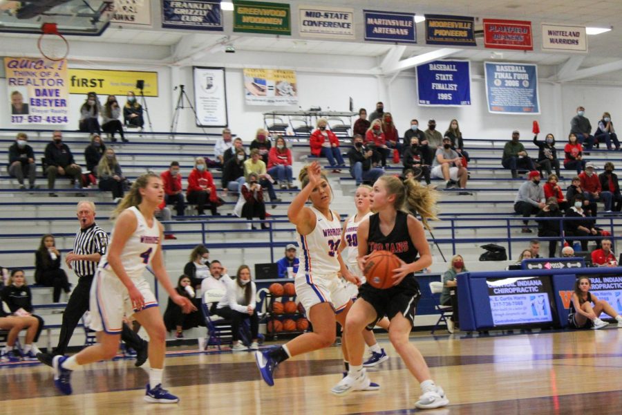 During the county championship game against Whiteland, Ella Hobson drives to the basket.