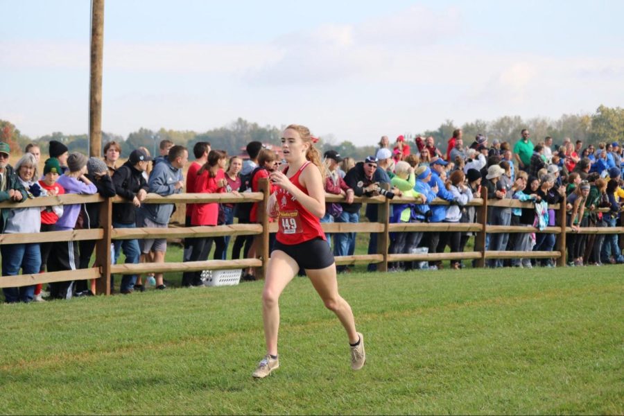 Bella Hodges finishes last Saturday at Blue River Cross Country Course.