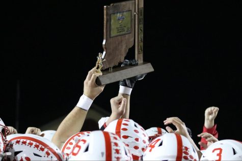 Center Grove hoists their sectional trophy after defeating Columbus North 41-7 for their 11th sectional title in a row. Center Grove will take on Lawrence North tonight in the regional game. 