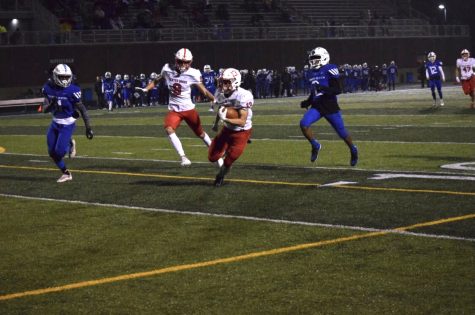 Brandon Wheat rushes for a touchdown against Franklin Central. Center Grove defeated Franklin Central 35-7 in the first round of sectionals. Wheat had 117 total yards and two touchdowns. The Trojans will take on Columbus North  tonight for the sectional title.
