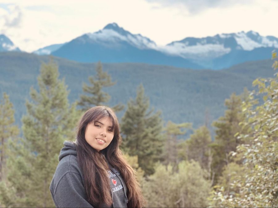Ana Tovar stands in front of mountains in Squamish, Canada. Photo contributed