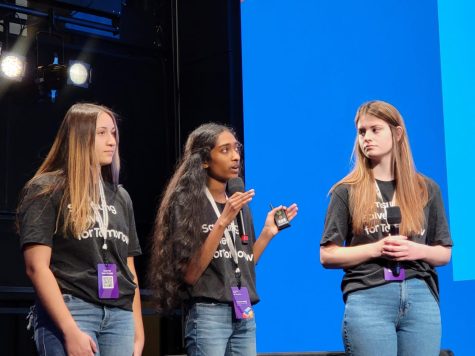 Seniors Hope Mander, Ananya Balaji and Paige Merrill (left to right) speak at the Solve for Tomorrow competition.