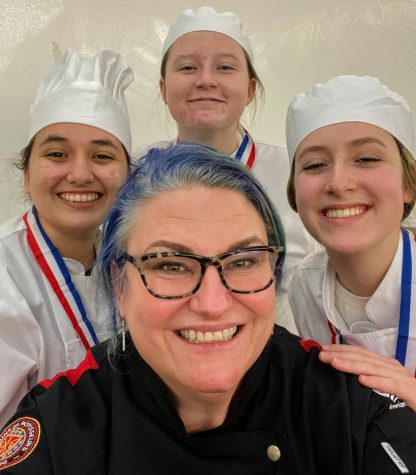 Chef Grier pictured with winners Senior Eva Alejo Sophomore Grayson Roberts and Freshman Emily Boyer (left to right).