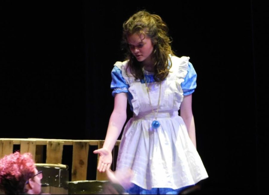 Junior Chloe Lutz performs on stage during a theater production. Photo contributed