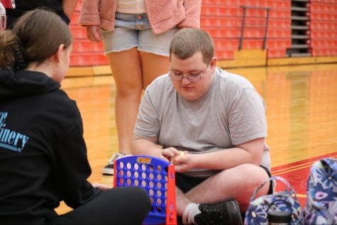While attending the Best Buddies callout meeting, freshman Claire Lollar sits down and plays Connect Four with freshman William Mangold. “I went to the call out meeting because I love making new friends no matter what abilities they have,” Lollar said. “I believe that even if someone has what we call special needs they should be able to be involved in meaningful relationships with their other peers.” The club’s goal is to make fellow students with IDD feel accepted, loved and welcomed.
