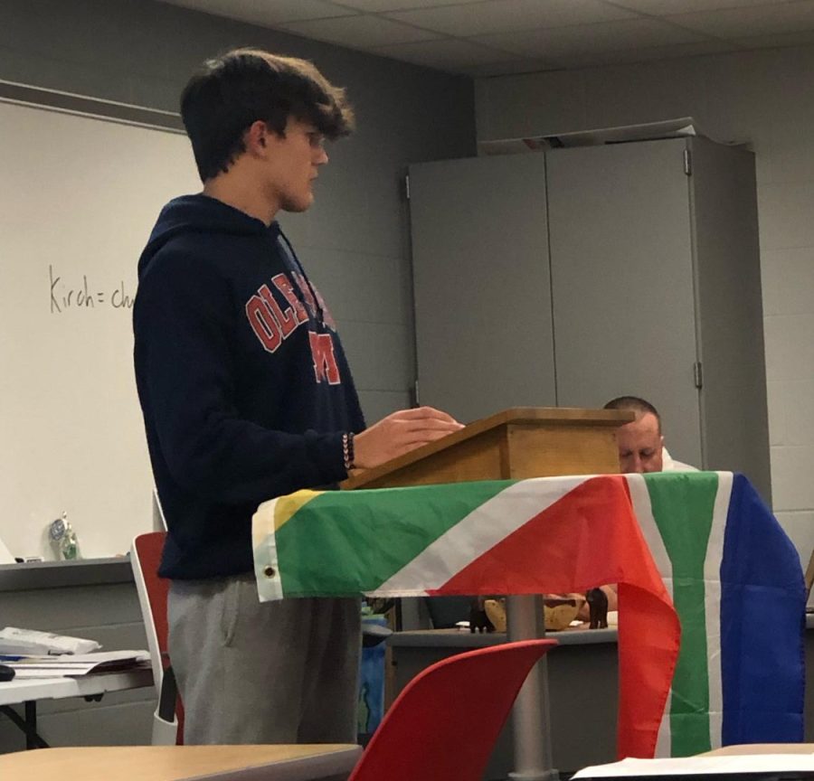 Sophomore Daxon Sauer presents his project as British philosopher Francis Bacon. 