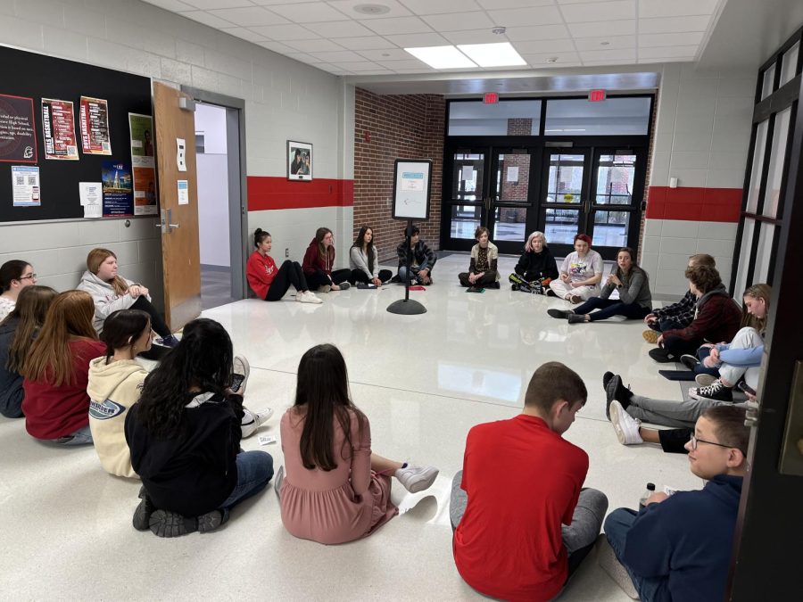 Students sit in a circle during a New for You Club callout meeting on Dec. 1.
