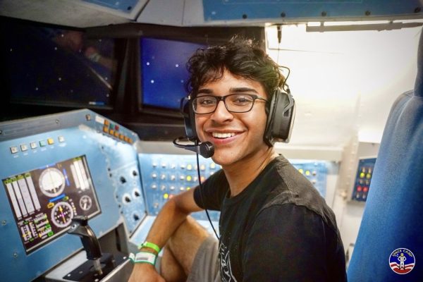 Junior Krishaan Vadia sits in the cockpit of a simulator at space camp in Alabama