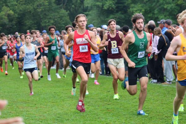 Senior Gavin Rockwell attempts to overtake a runner in the Eagle Classic. Rockwell is ranked No. 2 in the sectional, behind senior teammate Kyle Montgomery.