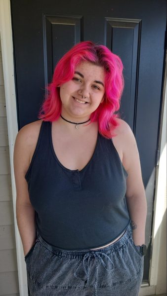 Junior Moth Smith uses tattooing and piercings to make others and herself more comfortable in their own skin. Smith began this hobby in 2021. 