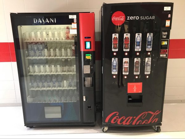 Vending machines sit in centralized locations around the cafeteria area, but is it a bad idea to disperse them around the school.