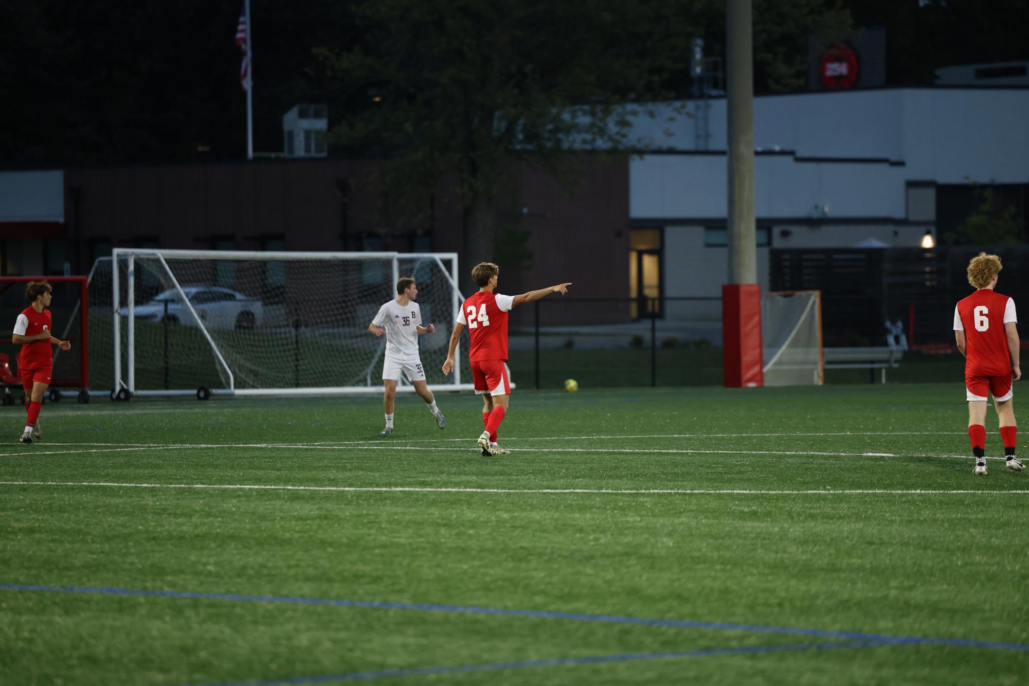 Senior Keaton Barnhizer organizes the team during the Trojans' 4-0 win against Brebeuf Jesuit.