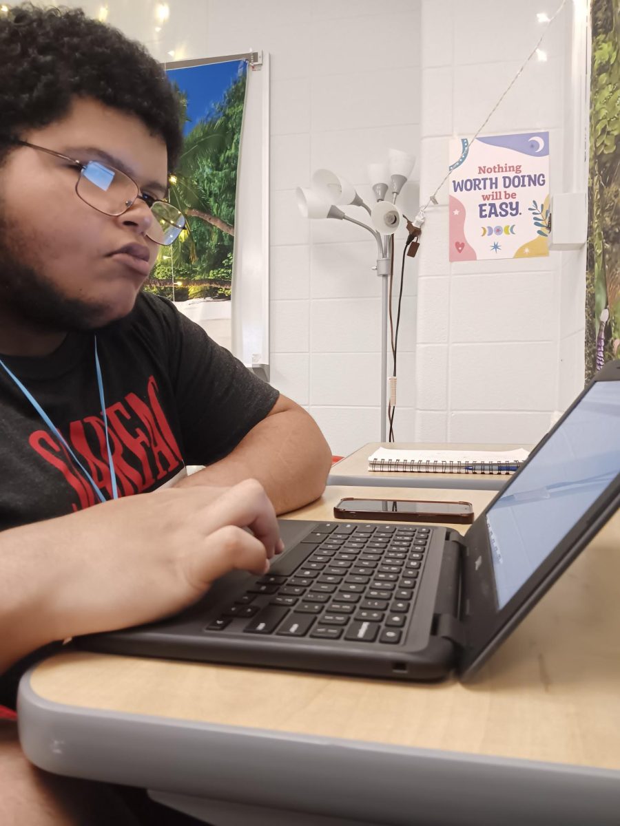 Senior Jackson Strong works on English shortly after lunch. Students completed their work on Plato, an online education program. “I think it’s really fun to see how sentences are created, how they are supposed to be written, and writing them in your own way,” Strong said.