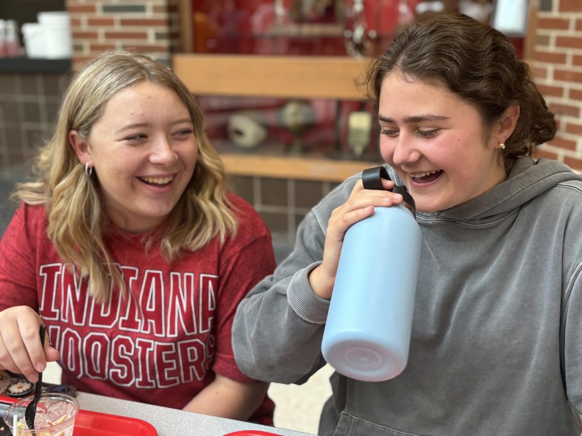 Sitting together, Addy Reed ‘26 and Lucy Willing ‘26 laugh at the lunch table. Willing had Global Campus Speech, while Reed was in AP United States history, but both ate C lunch. “Lunch gives me time to laugh and relax with friends,” Reed said. ”Even if lunch is usually filled with a lot of laughter and talking I can get a sense of quiet time away from the long school day.”