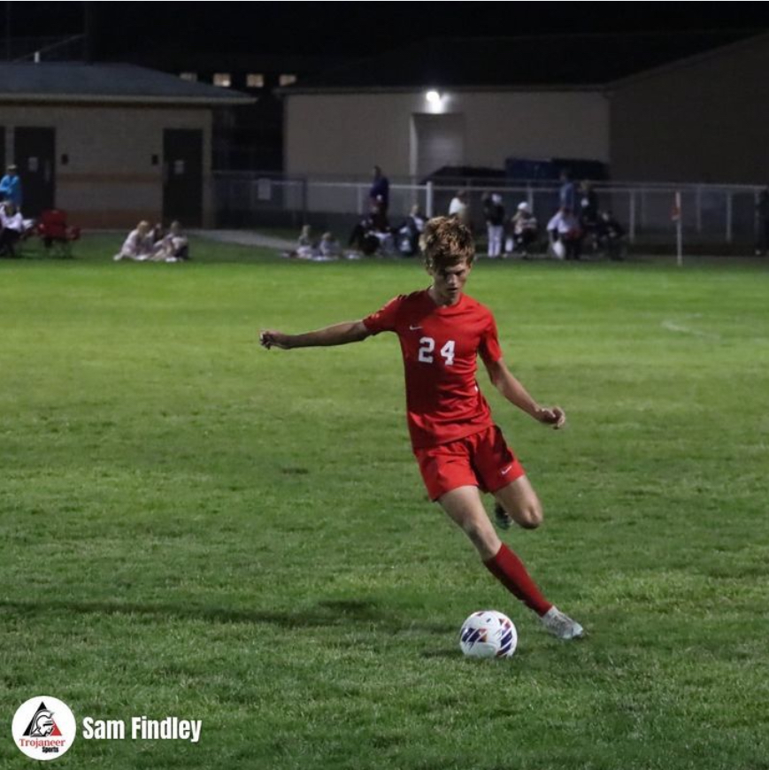 Senior Keaton Barnhizer looks for a pass during the Trojans' 4-0 win against Bloomington North in the sectional semi-final on October 5, 2022.