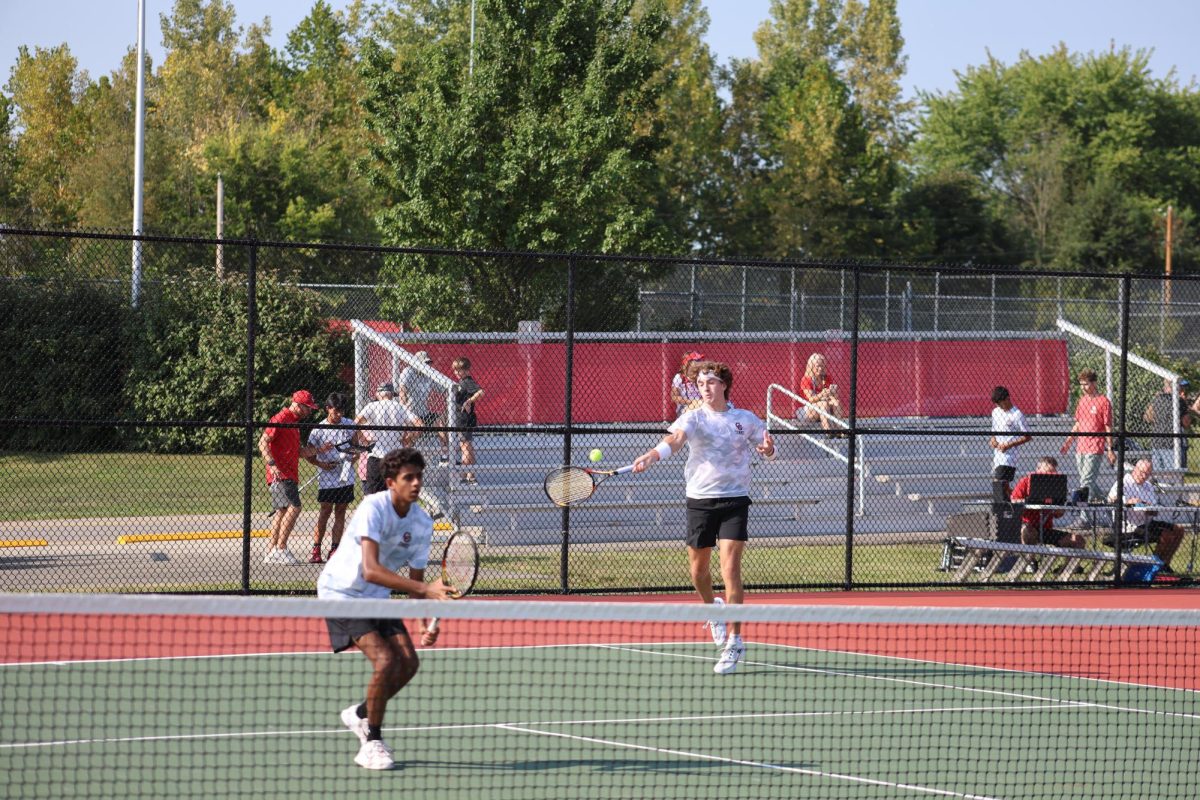 Seniors Daksh Patel and Carson Bush were part of the effort behind Center Grove's first tennis win against Carmel since 2009. The boys soccer team would play later in the day, where they would win 2-1 against three-time defending state champions Noblesville.