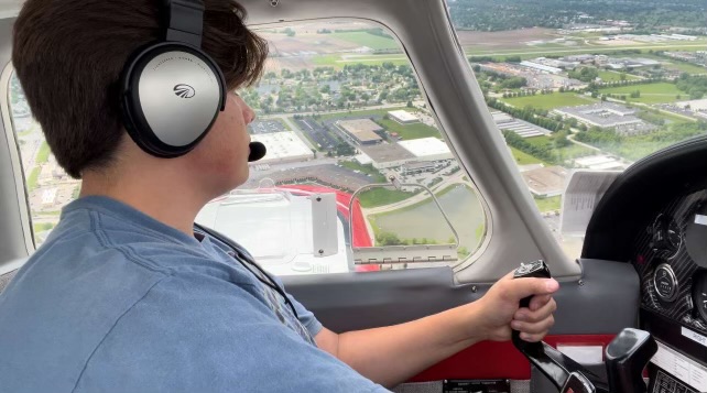 Senior Noah Nguyen flies a plane on June 13, 2024