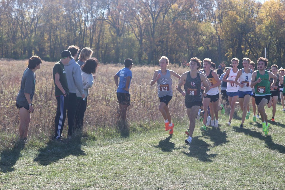 Junior Cameron Cox leads his pack during the regional race in Shelbyville on October 26, 2024.