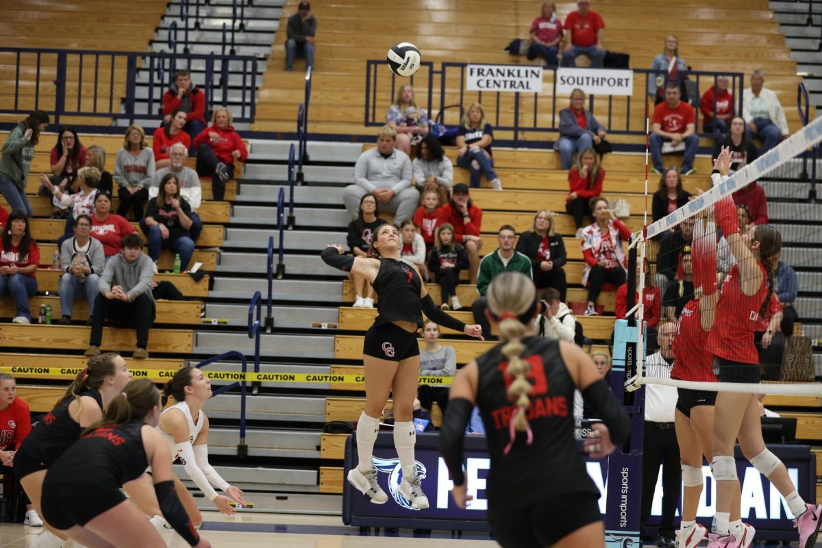 Senior Ellen Zapp goes for a kill during the sectional final against Southport. Zapp reached the 1,000 kills mark in their sectional game against Perry Meridian earlier in the season.