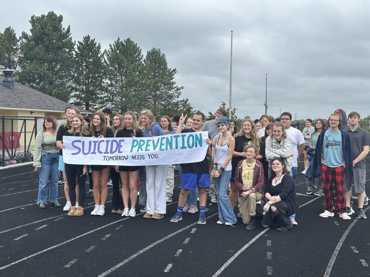 Bring Change 2 Mind Club takes a photo at the suicide prevention walk. This event spread awareness with a social event on Monday, Sept. 30. “My favorite part so far is probably the community that we have created,” freshman Isabel McKay said. 