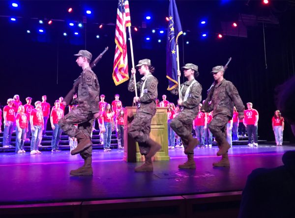 Members of the JROTC march during the opening portion of the Veteran's Day Program.