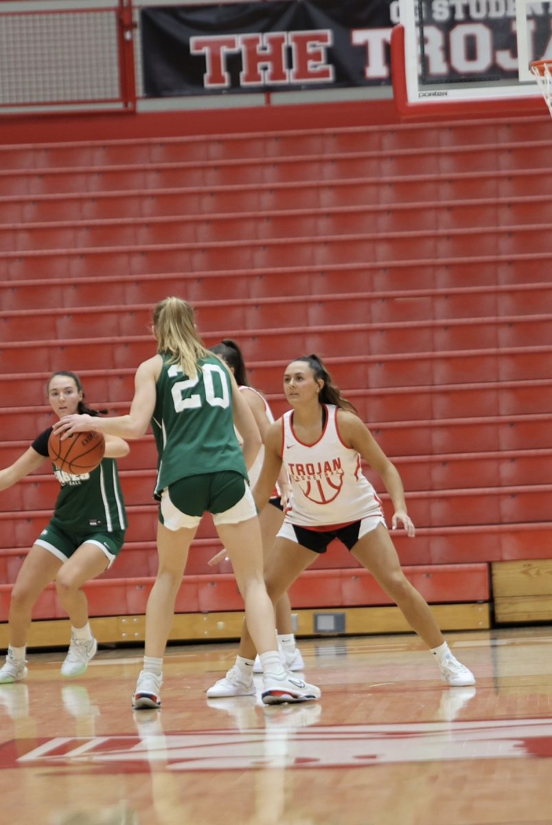 Junior Hannah Gin plays defense during the team’s scrimmage versus Zionszille. Gin has played basketball since she was in second grade and defense has always been her favorite to play. “Defense is my absolute favorite part of basketball. It is what I’m best at and enjoy doing the most,” Gin said. 