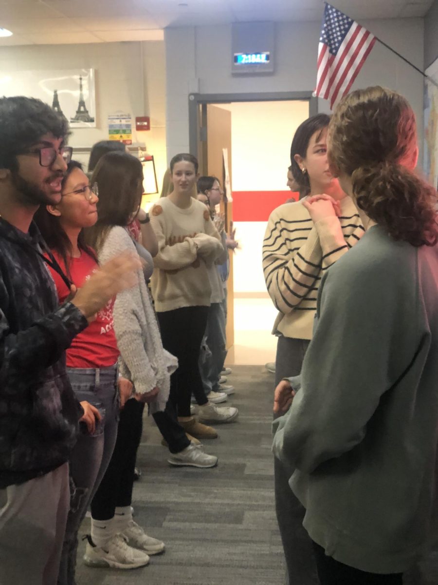 Senior Krishaan Vadia participates in a conversation line during a morning French Honors Society meeting. Vadia is the vice-president of the club, and the conversations are a way to get younger members more comfortable with the language. “I really enjoy the collaborative, non-judgmental aspect of French conversation tables,” Vadia said. “It encourages us to use our knowledge of the language more organically without worrying too much about perfect grammar. I think it makes us all more comfortable with the experimentation that comes with learning a new language.”