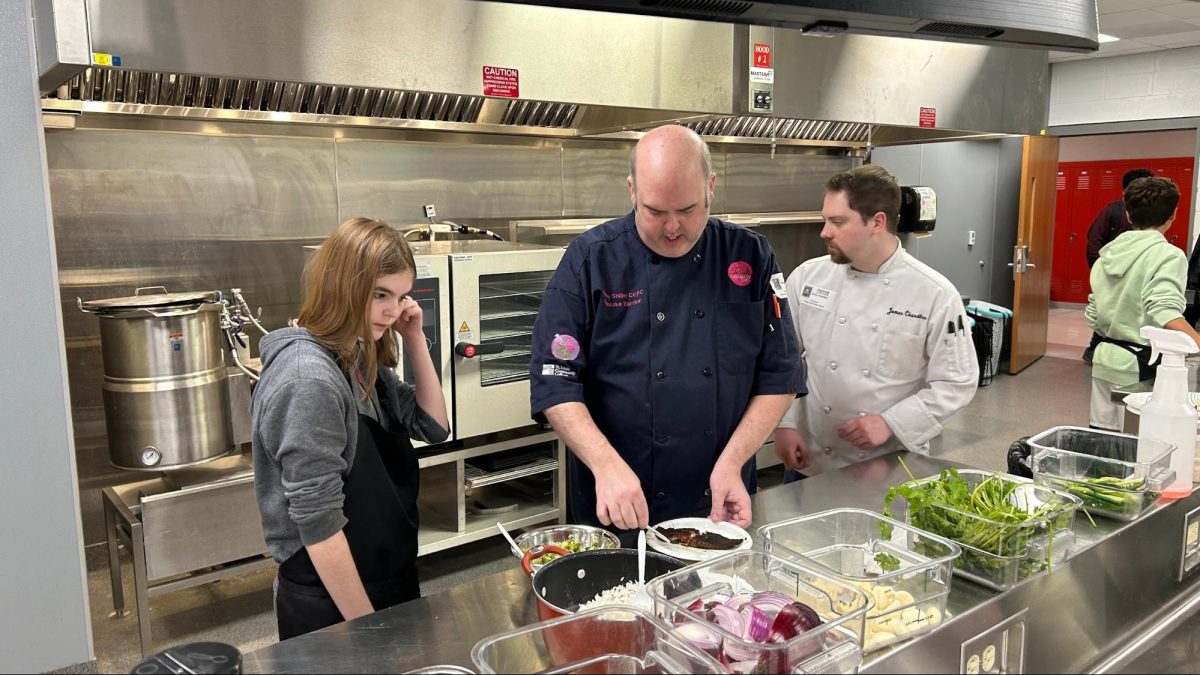 Guest chef competing in World Food Championships tours culinary department, meets with students