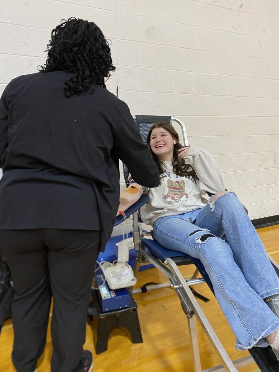 After donating blood for years, junior Norin Kelly gets ready to donate blood for the first time at this school. At the Key Club Blood Drive, students were able to donate blood during school. “I grew up watching my mom help people by donating blood, and I know people personally who have been saved by blood donation, so that made me want to donate blood,” Kelly said.