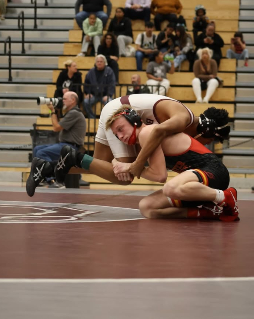 Senior Eddie Goss wrestles in a meet against Lawrence Central.