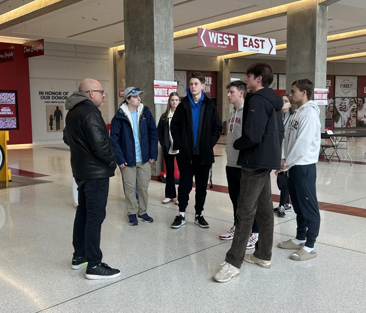 During their field trip to Indiana University Media School and the Cuban Center, junior Brandon Tripp and other Student Publications students listen to Jeremy Grey during their tour inside Assembly Hall.  They also toured the Franklin Hall and learned about the opportunities IU has to offer. “My favorite part was getting to see the Cuban Center and the media school,” Tripp said. “I feel like I am going to go into media, so seeing both of those showed me what I could do when I go to college.”