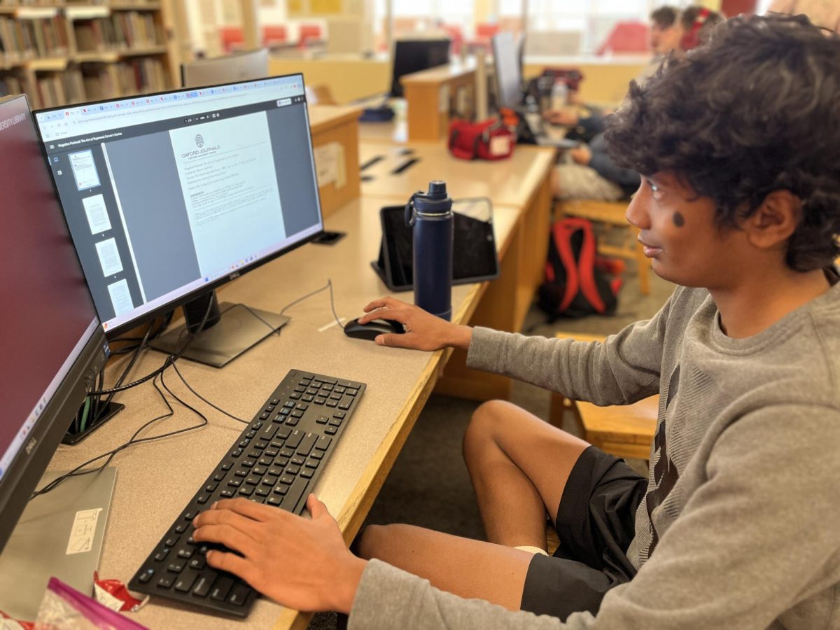 Sophomore Subir Thakur works to find a variety of sources to help in his current project in English 10 Honors. He found 15 sources for himself and his group got a total of around 40. “It helps get some of the criticisms for the project. Being in a big library with all these resources is very helpful," Thakur said.