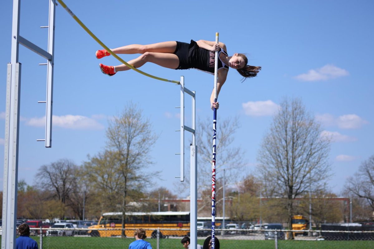 Senior Khloie Walker soars over the crossbar during a meet at Columbus North on April 12, 2025. She finished first in the meet with a final height of 11' 6".