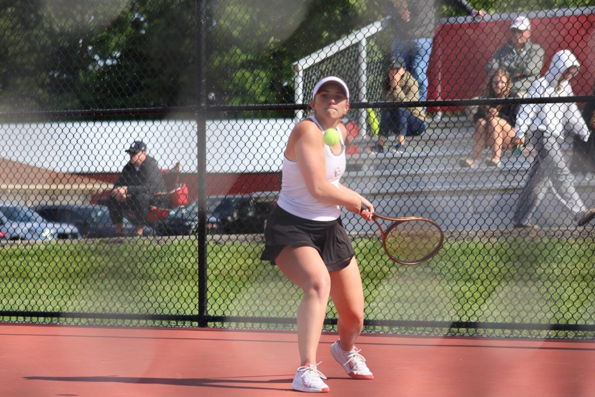 Junior Sloane Small goes for a backhand in the sectional championship against Franklin on May 22, 2025.