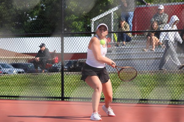 Junior Sloane Small goes for a backhand in the sectional championship against Franklin on May 22, 2025.