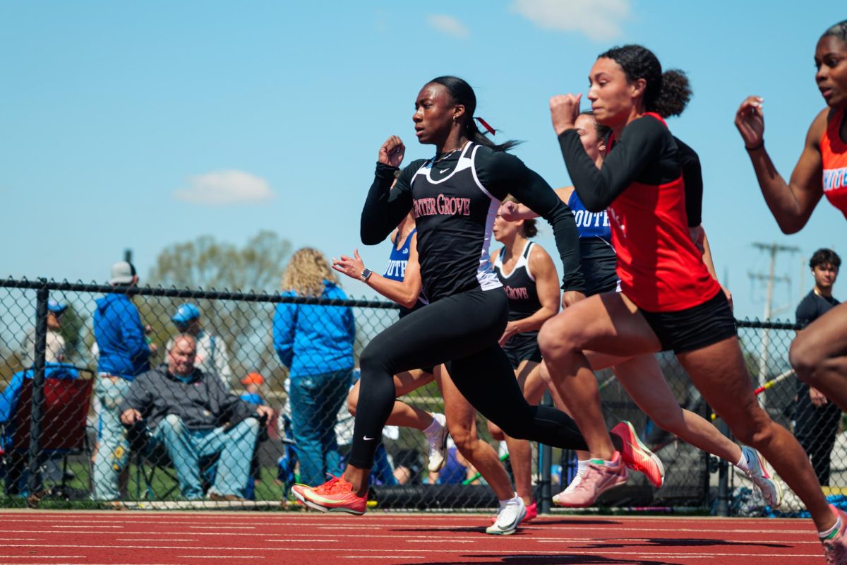 Junior Channing Hazzard leads her heat during the Columbus North invite this season.