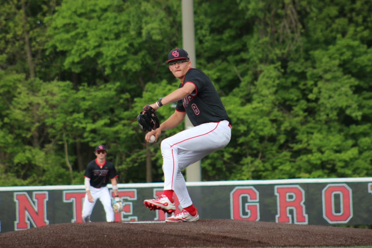 Junior Kellen Thomson pitches in the Trojans' last matchup against Brownsburg, which they lost 4-3 courtesy of an extra inning.
