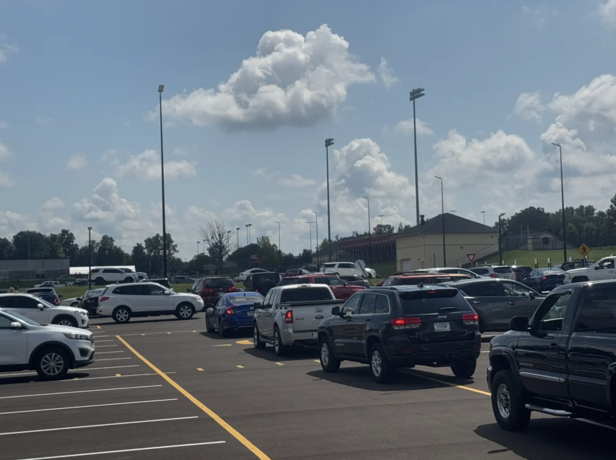 Student parking lot backs up as students try to get out of the main student parking lot Wednesday after school. Senior Kaylee Whitaker drove her Subaru Forester to school and  parked in the main student parking lot, experiencing the traffic jam. “It hard to get out of the parking lot since people are agressive,” Whitaker said. “I still like parking in the main lot since it’s the easiest way for me to get home.”
