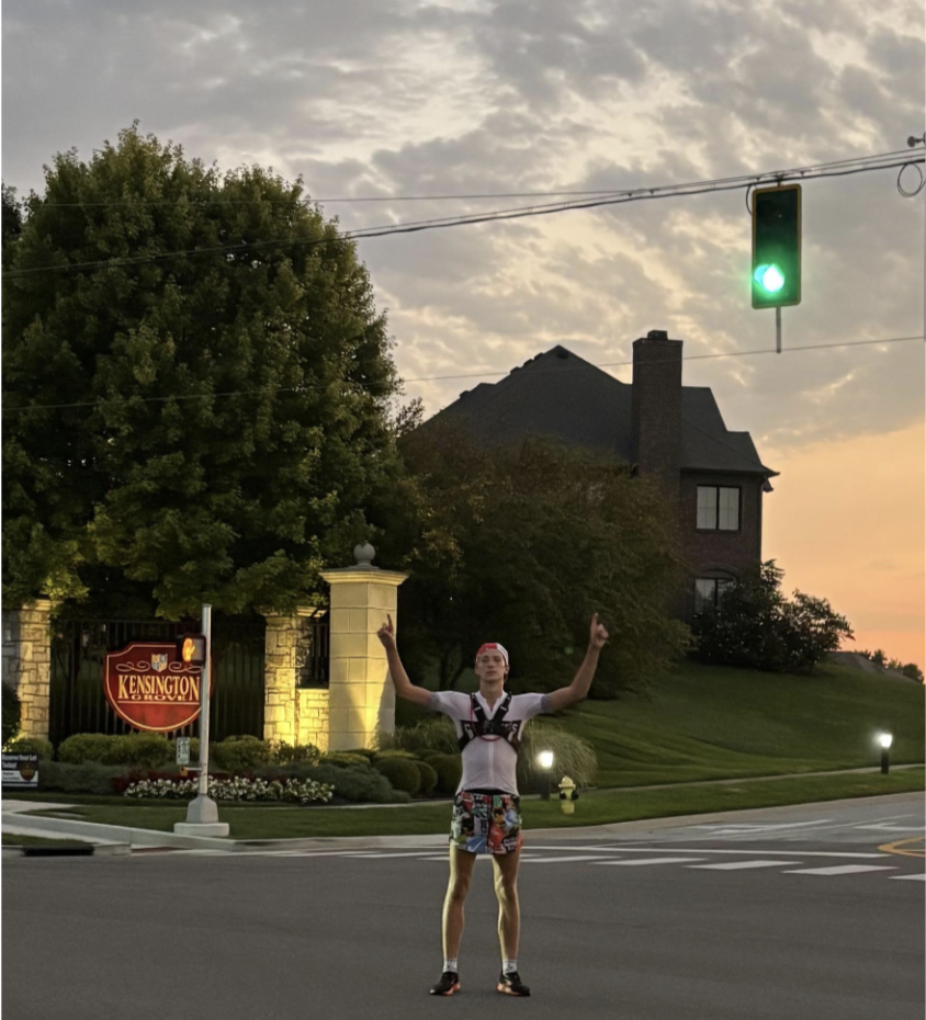 Junior Charlie Rolfsen poses during his attempt to run 100 miles over the weekend.