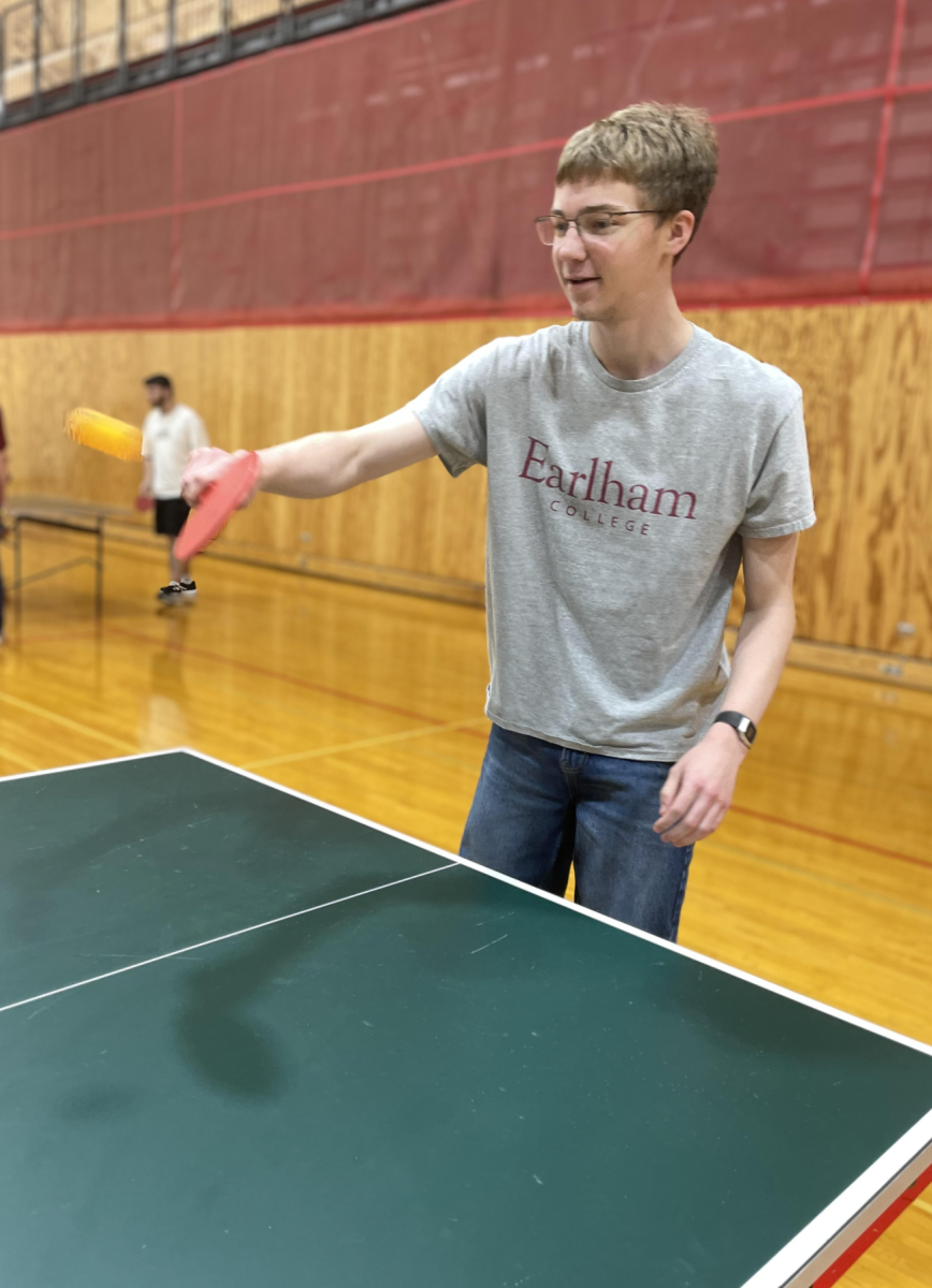 Senior Roman King returns a shot during Ping Pong Club's first meeting.