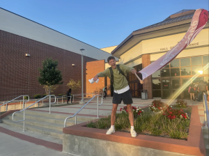"Emmy Award-winning sports director Anthony Calhoun nominated Center Grove as one of the Top 10 “Best Student Section” in Indiana this past week. Junior Charlie Rolfsen has been working to bring awareness to these football games in order to create a larger student section. 

“I think that waving the flag should most definitely boost the amount of students attending the football games. It is not talked about enough around the school, and some kids have no idea when the game is or that there even is a game. I hope my flag can bring awareness to our sports team.” 

Every Friday, whether its home or away, Rolfsen is outside Door 9 making sure every student is aware there is a game that evening. 

“I love watching our schools football program, and I want everyone there to support them. It helps so much to have a whole section of peers rooting you on, and the team puts to much work into their to go unnoticed.” 