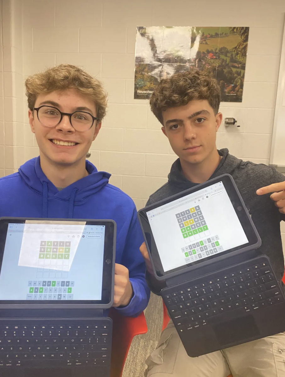 Juniors Austin Petkovich and Maddox May pose after working together to solve the Wordle in their 2nd period APUSH class. Intellectual games like Wordle and Connections have amassed over 6 billion plays in total since they were created and are very popular with students. “We play Wordle together every day," Petkovich said. "I think we are getting pretty good at it."