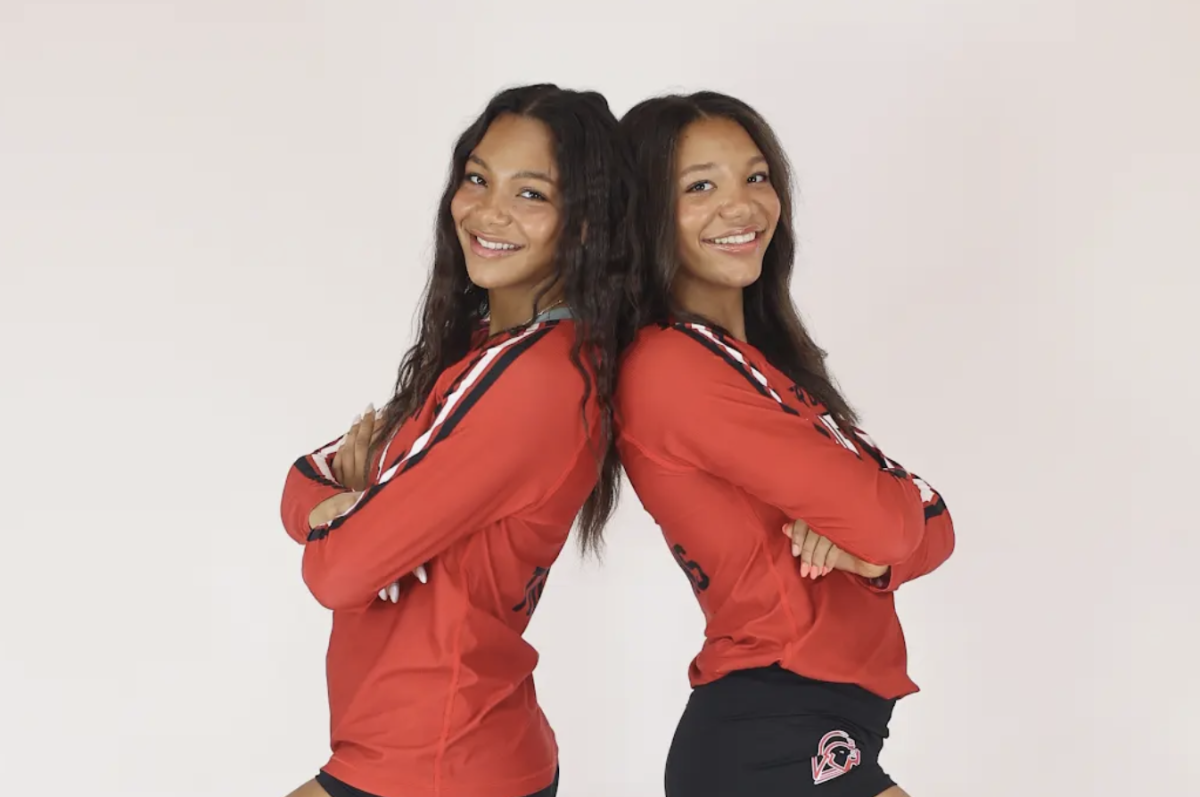 Senior Gracyn Gilliard (Left) and Freshman Gabby Gilliard (Right) pose for a photo during media day.