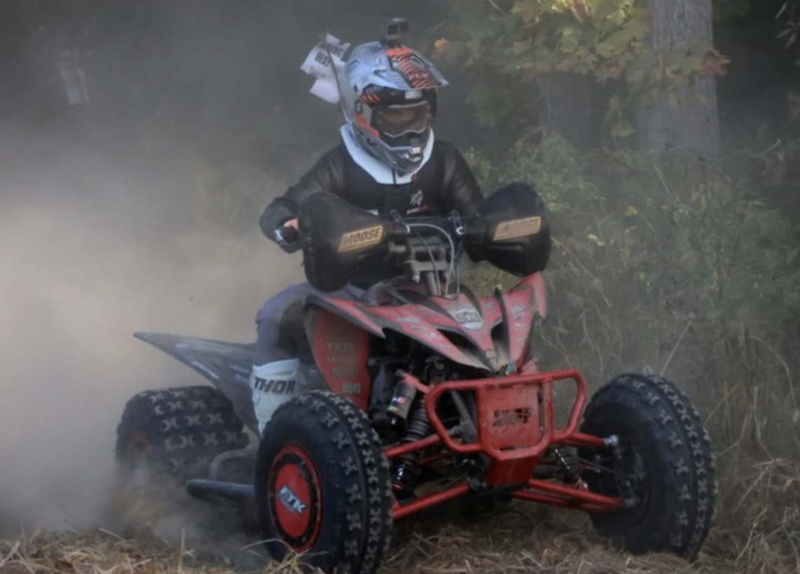 Colton Mull races on his four wheeler.