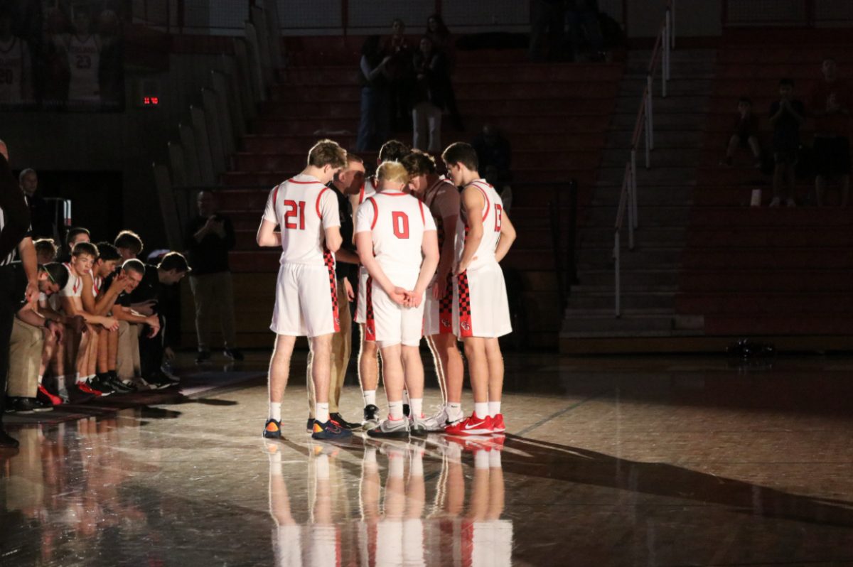Boys basketball pre game huddle before their 60-58 win over Franklin Central on 1/29
