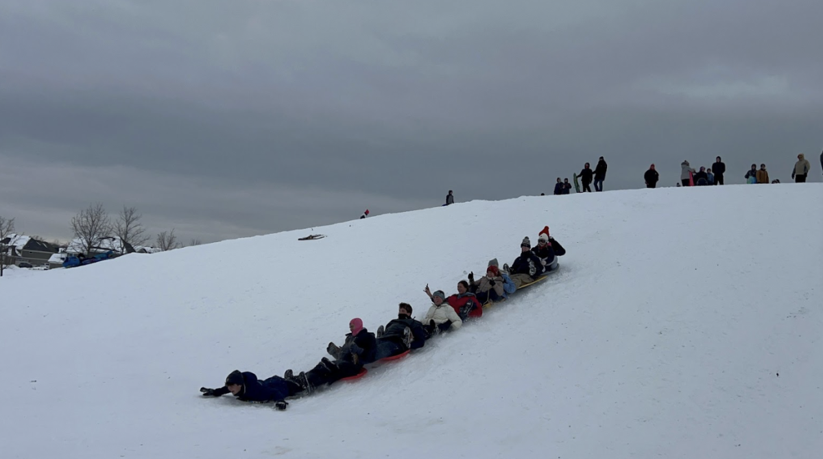 Students go sledding during an e-learning day in December.